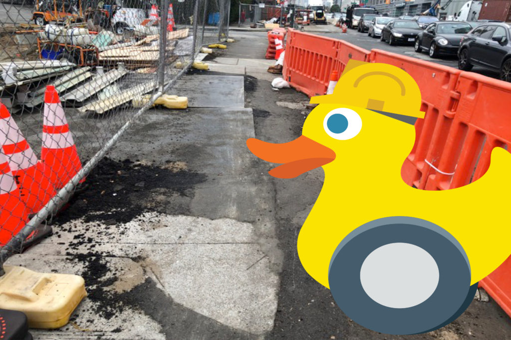 photo of hazardous sidewalk with image of yellow duck added