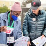 Two people sharing information about emergency preparedness